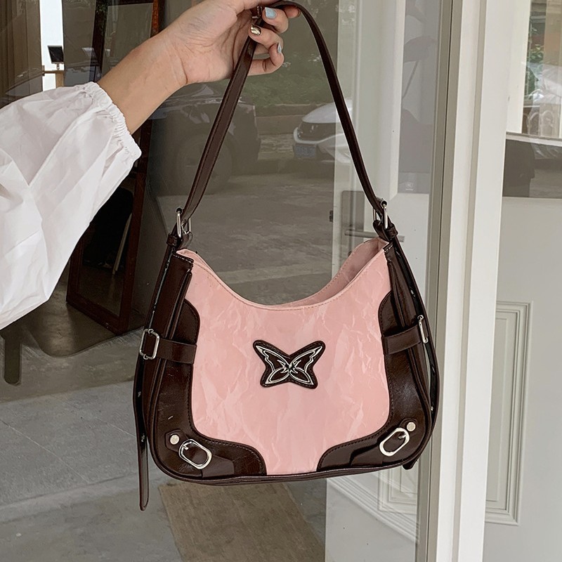 Bolso bandolera estilo biker con diseño de bloques de color y motivo de mariposa